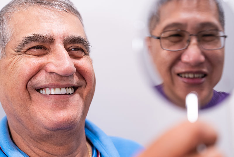 Patient looking into mirror