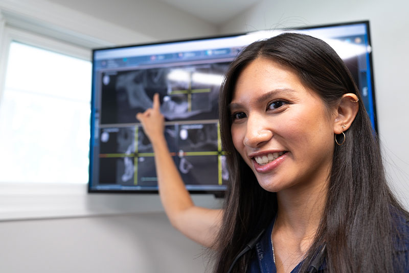 doctor going over dental x-ray with Patient