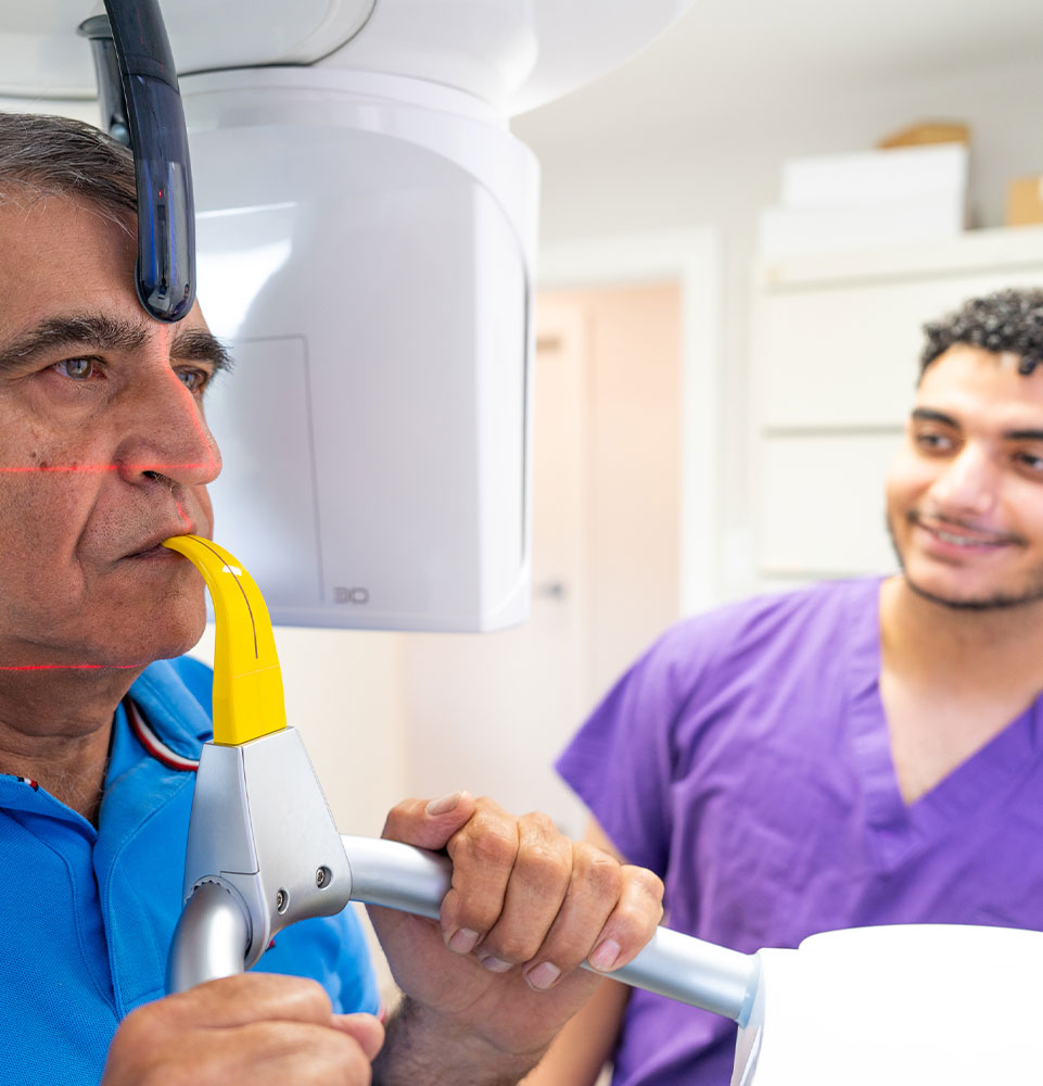 Patient taking a dental x-ray