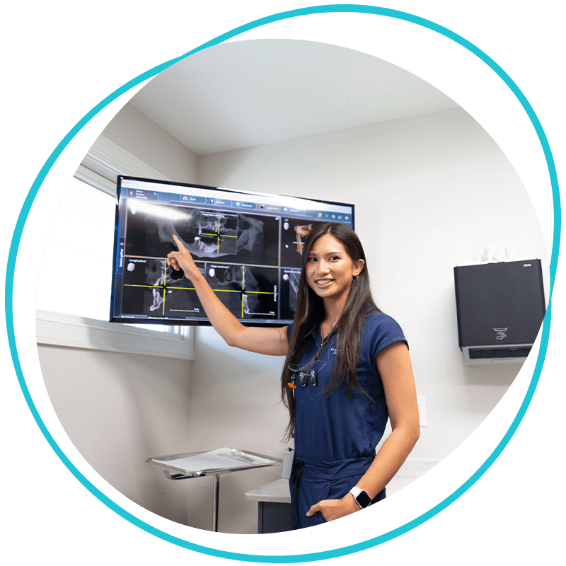 Doctor pointing at dental x-ray