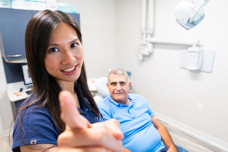 Doctor Going over dental x-ray with Patient